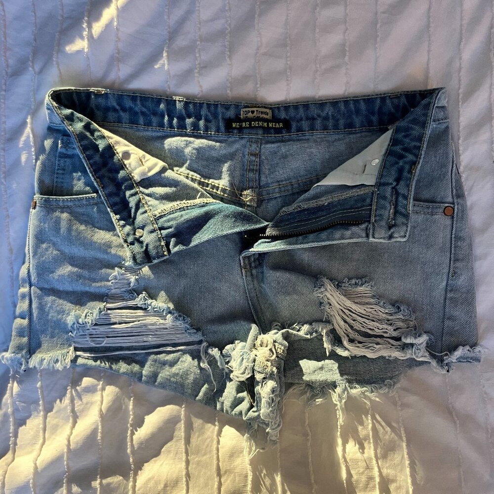 Ripped Light Wash Denim Shorts